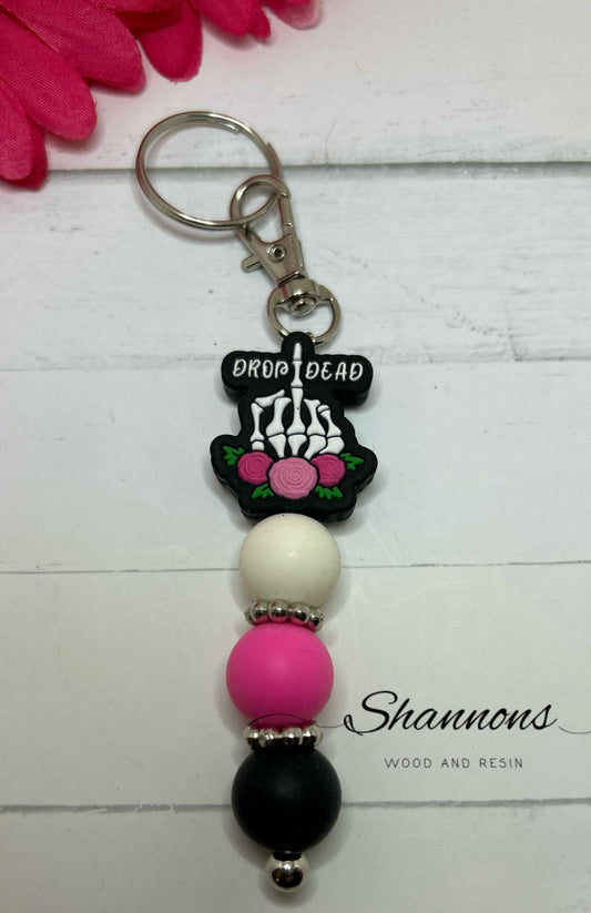 DROP DEAD SKELETON HAND SILICONE KEYCHAIN